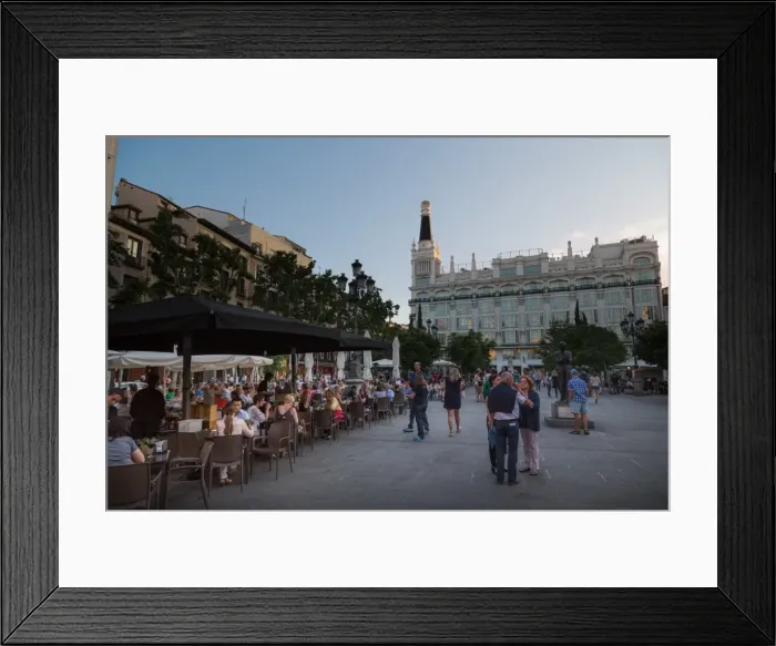 Framed Print : People relaxing in in the evening in Plaza de Santa Ana in Madrid, Spain, Europe Framed Print : People relaxing in in the evening in Plaza de Santa Ana in Madrid, Spain, Europe