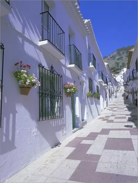 Street in the white hill village of Mijas