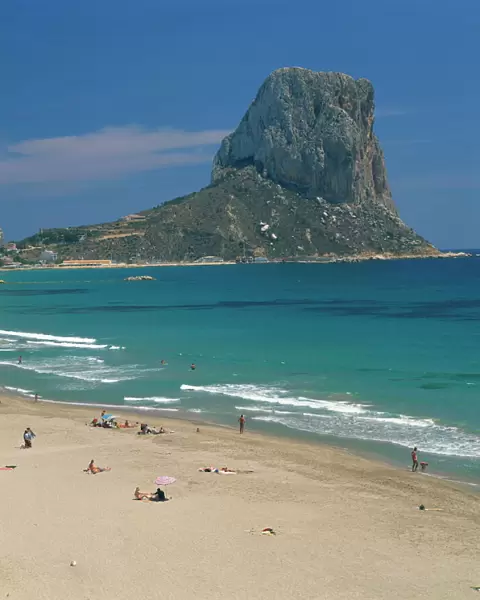 Tourists on the beach at Calpe and the Penon de Ifach