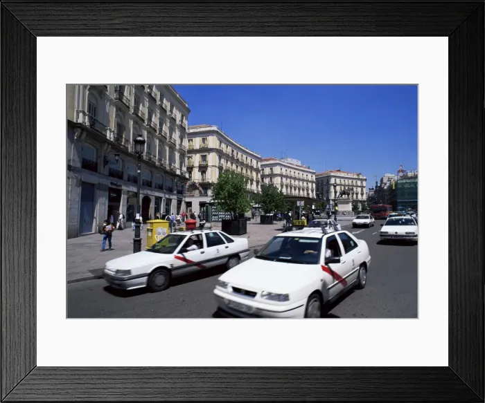 Framed Print : Traffic moves around square Framed Print : Traffic moves around square
