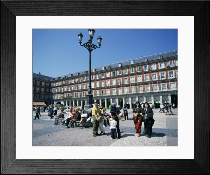 Framed Print : People at a popular meeting point in the Plaza Mayor in Madrid Framed Print : People at a popular meeting point in the Plaza Mayor in Madrid