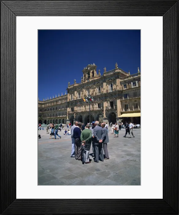 Framed Print : A group of men talking in front of the town hall in the Plaza Mayor Framed Print : A group of men talking in front of the town hall in the Plaza Mayor