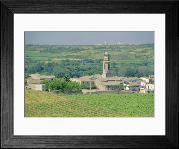 Framed Print : View to village across agricultural land Framed Print : View to village across agricultural land