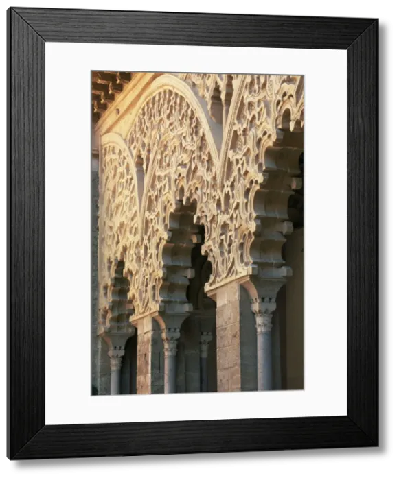 Framed Print : Intricately carved Moorish architecture lining Framed Print : Intricately carved Moorish architecture lining