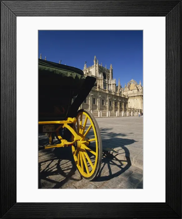 Framed Print : Horse-drawn carriage in Plaza del Triunfo in front of the cathedral Framed Print : Horse-drawn carriage in Plaza del Triunfo in front of the cathedral