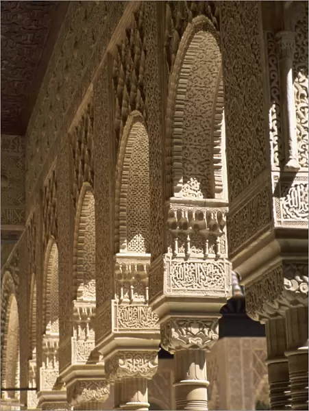 Finely carved Moorish columns in the Patio de los Leones