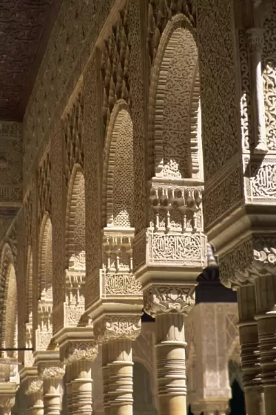 Finely carved Moorish columns in the Patio de los Leones
