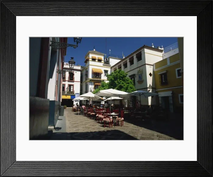 Framed Print : Outdoor restaurant in the Plaza de los Venerables Framed Print : Outdoor restaurant in the Plaza de los Venerables