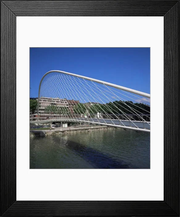 Framed Print : Zubizuri curved pedestrian bridge across the Bilbao River Framed Print : Zubizuri curved pedestrian bridge across the Bilbao River