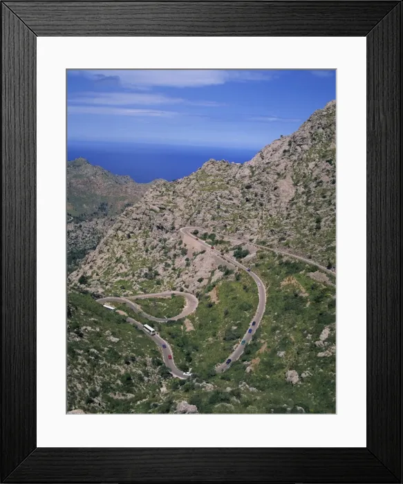 Framed Print : Hairpin bends on winding road up a rocky hill at La Alobra Framed Print : Hairpin bends on winding road up a rocky hill at La Alobra