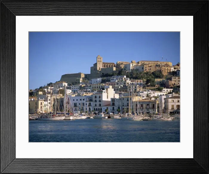 Framed Print : Boats in the harbour and the houses and church of Ibiza Town behind Framed Print : Boats in the harbour and the houses and church of Ibiza Town behind