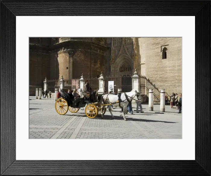 Framed Print : Horse and carriages with cathedral behind Framed Print : Horse and carriages with cathedral behind