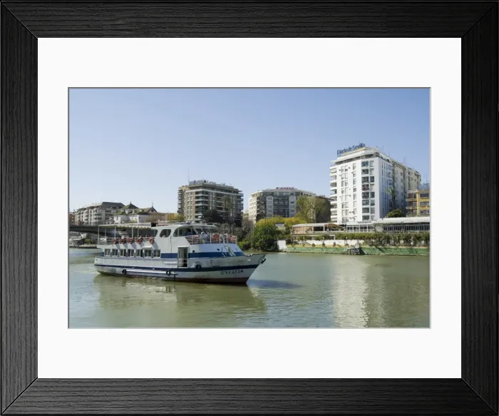 Framed Print : Triana district on left and the river Rio Guadalquivir Framed Print : Triana district on left and the river Rio Guadalquivir