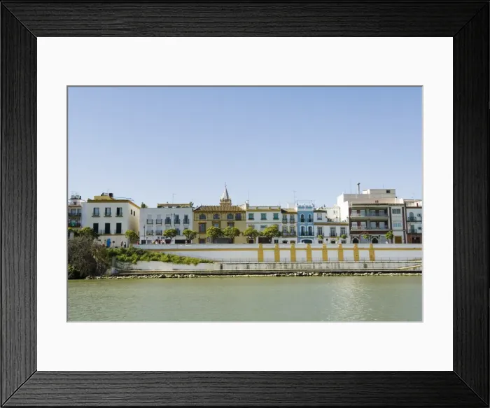 Framed Print : Triana district on left and the river Rio Guadalquivir Framed Print : Triana district on left and the river Rio Guadalquivir