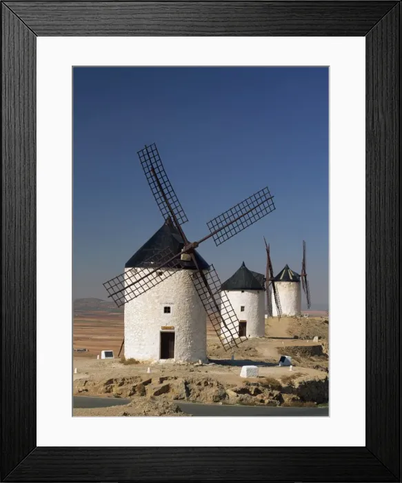 Framed Print : A line of windmills above the village of Consuegra Framed Print : A line of windmills above the village of Consuegra