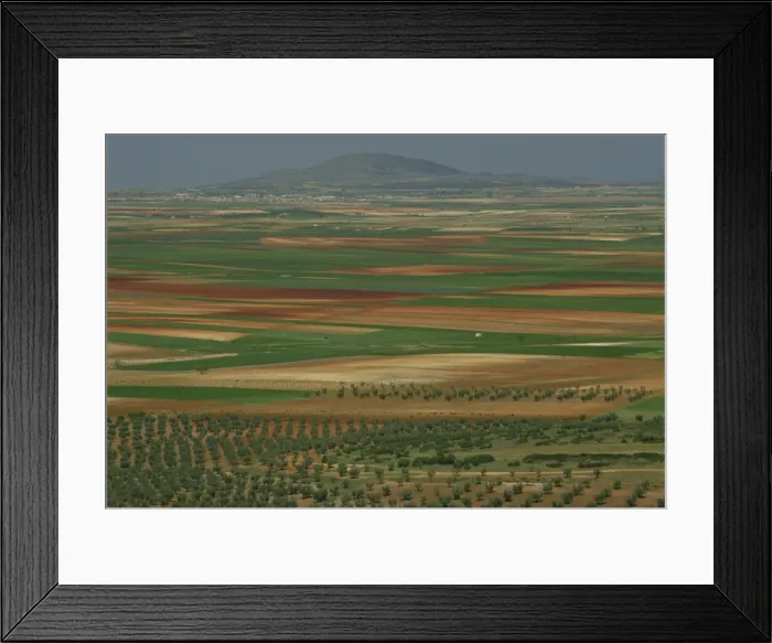 Framed Print : Aerial view of landscape of fields around the town Framed Print : Aerial view of landscape of fields around the town