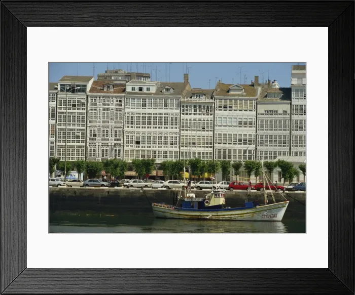 Framed Print : A fishing boat in the harbour of the town of La Coruna in Galicia Framed Print : A fishing boat in the harbour of the town of La Coruna in Galicia