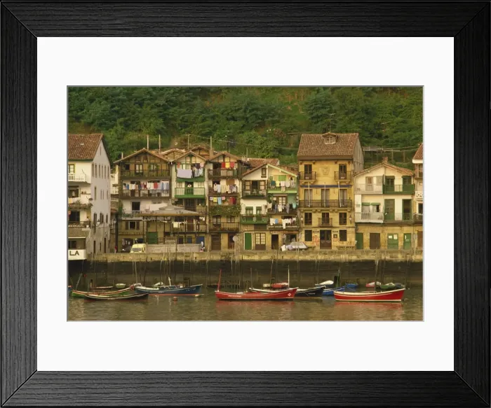 Framed Print : Traditional houses along the waterfront and small boats Framed Print : Traditional houses along the waterfront and small boats