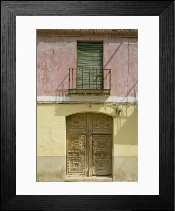 Framed Print : Close-up of exterior of a wooden door and small balcony