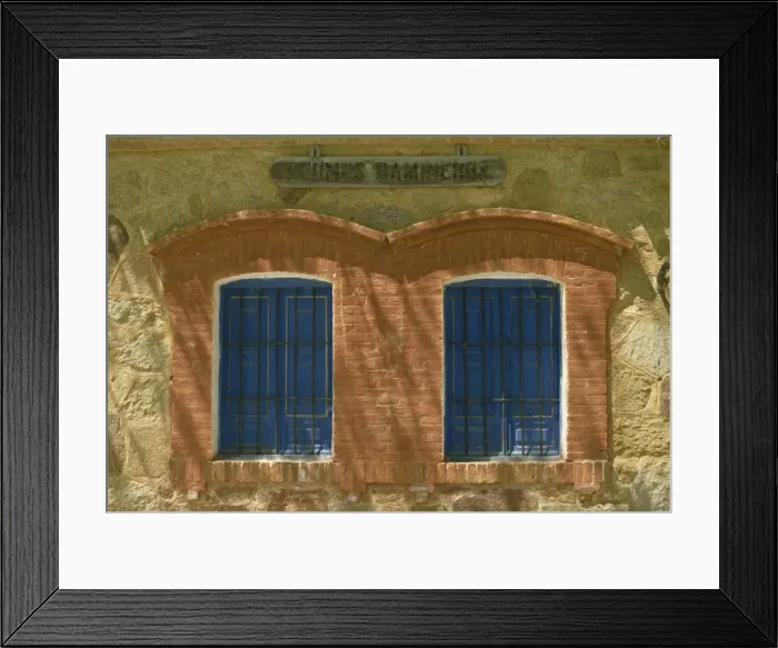 Framed Print : Close-up of typical windows with bars and blue shutters Framed Print : Close-up of typical windows with bars and blue shutters