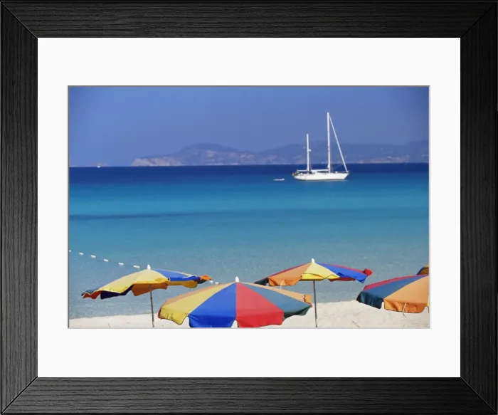 Framed Print : Colourful umbrellas on Playa de ses Illetes beach Framed Print : Colourful umbrellas on Playa de ses Illetes beach