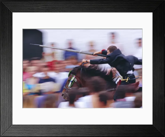 Framed Print : Horse rider jousting with target during the Sant Joans festival Framed Print : Horse rider jousting with target during the Sant Joans festival