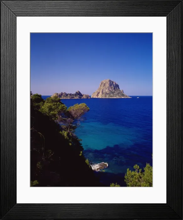 Framed Print : View of the rocky islet of Es Vedra from Cala d Hort Framed Print : View of the rocky islet of Es Vedra from Cala d Hort