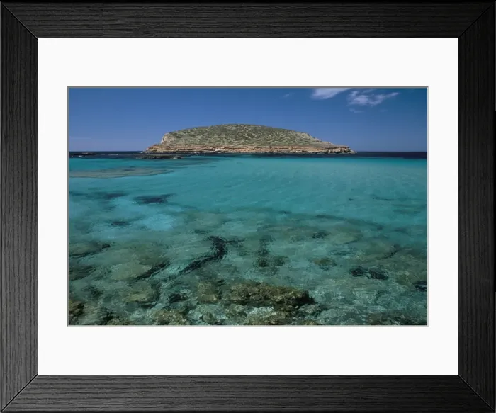 Framed Print : Cala Comta and the rocky islet of Illa d es Bosc Framed Print : Cala Comta and the rocky islet of Illa d es Bosc