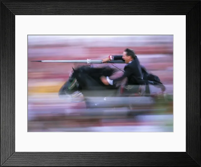 Framed Print : Rider speeding during the Medieval Games, festival celebrated on St Framed Print : Rider speeding during the Medieval Games, festival celebrated on St