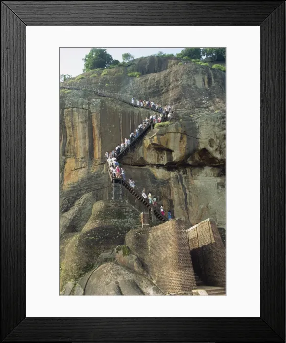 Framed Print : Tourists climbing the rock Framed Print : Tourists climbing the rock