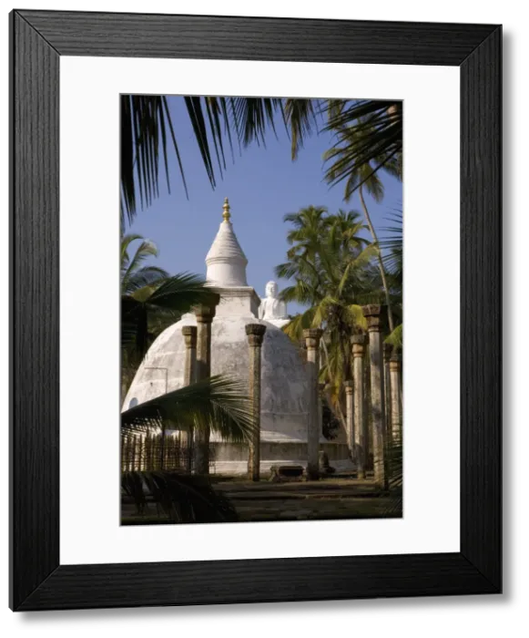 Framed Print : Great seated Buddha statue and dagoba (stupa) at Mihintale Framed Print : Great seated Buddha statue and dagoba (stupa) at Mihintale