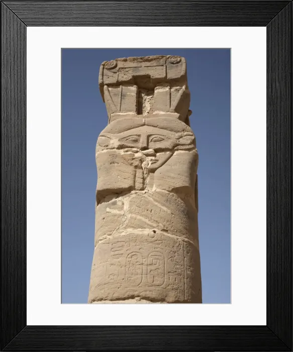Framed Print : A carved pillar stands at the entrance to the Temple Framed Print : A carved pillar stands at the entrance to the Temple