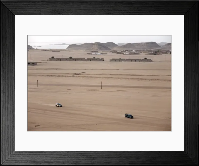 Framed Print : Jeeps cover the wide expanse of desert between Lake Framed Print : Jeeps cover the wide expanse of desert between Lake