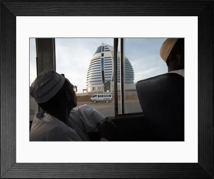 Framed Print : A bus passes the 5-star Boji Al-Fateh Hotel (Libyan Hotel) Framed Print : A bus passes the 5-star Boji Al-Fateh Hotel (Libyan Hotel)