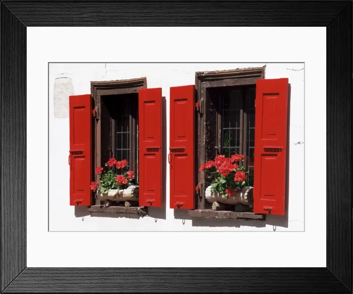 Framed Print : Red shuttered windows and geraniums Framed Print : Red shuttered windows and geraniums