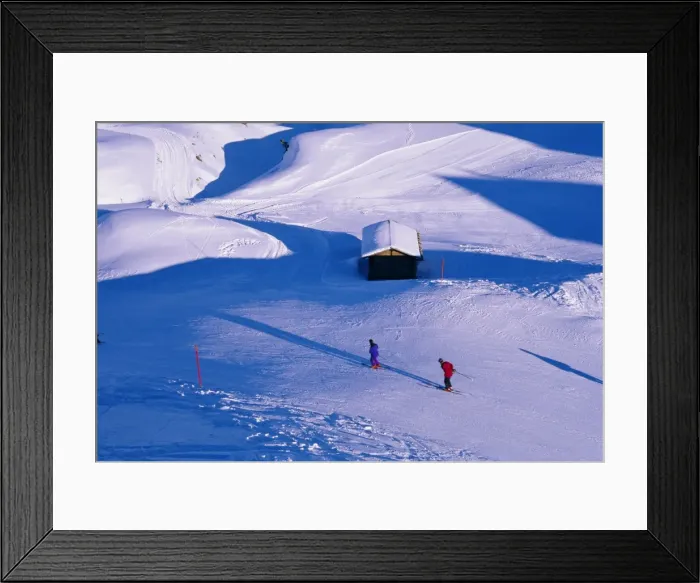 Framed Print : Aerial view of skiers and alpine hut Framed Print : Aerial view of skiers and alpine hut