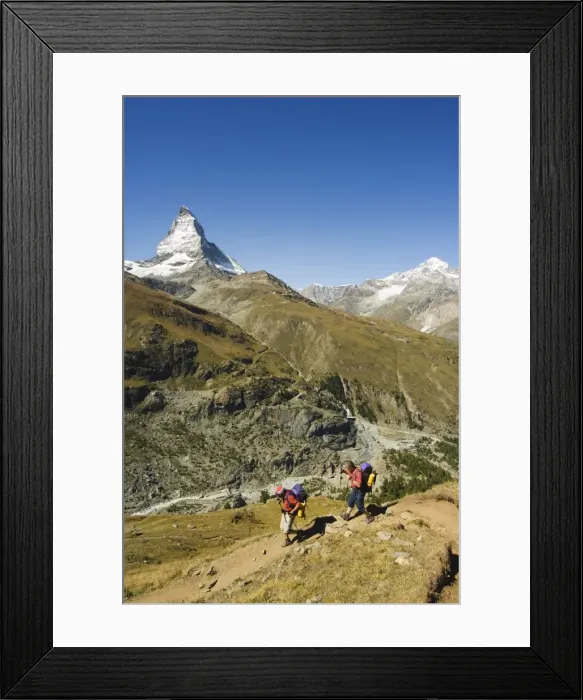 Framed Print : Hikers walking on trail near the Matterhorn Framed Print : Hikers walking on trail near the Matterhorn