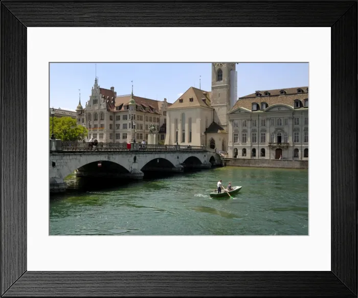 Framed Print : Couple in a boat next to the Munster bridge Framed Print : Couple in a boat next to the Munster bridge