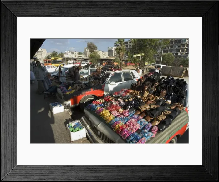 Framed Print : Shoe seller Framed Print : Shoe seller