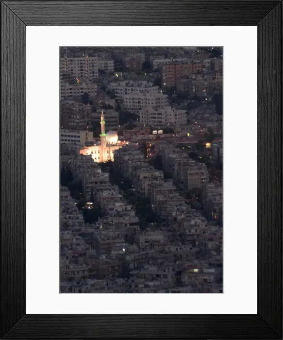 Framed Print : Aerial view of city at night including a floodlit mosque Framed Print : Aerial view of city at night including a floodlit mosque