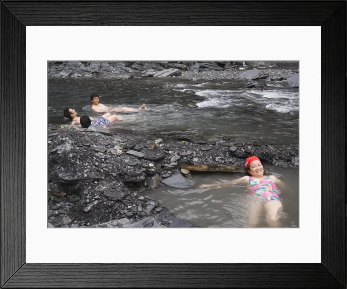 Framed Print : People enjoying natural hot river water of Tona hotspring bath resort Framed Print : People enjoying natural hot river water of Tona hotspring bath resort
