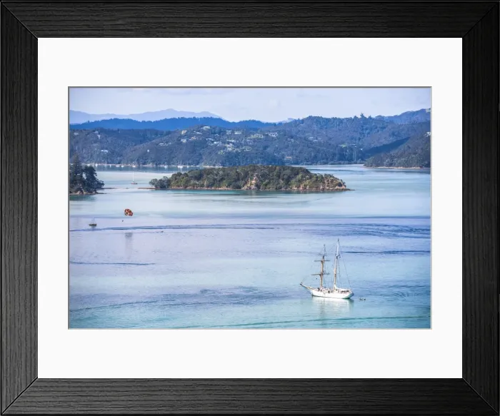Framed Print : Sailing boat in the Bay of Islands seen from Russell, Northland Region, North Island Framed Print : Sailing boat in the Bay of Islands seen from Russell, Northland Region, North Island