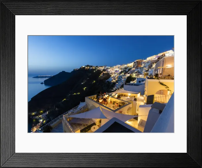 Framed Print : View of the Aegean Sea from the typical Greek village of Firostefani at dusk, Santorini Framed Print : View of the Aegean Sea from the typical Greek village of Firostefani at dusk, Santorini