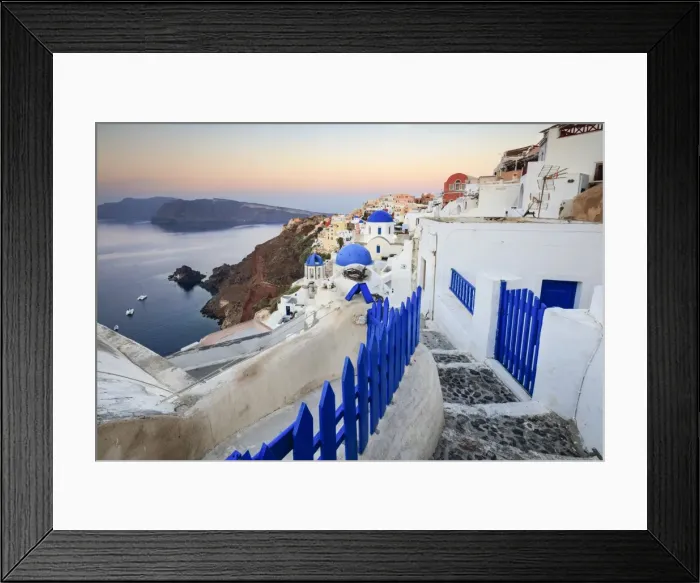 Framed Print : The last light of dusk over the Aegean Sea seen from the typical village of Oia, Santorini Framed Print : The last light of dusk over the Aegean Sea seen from the typical village of Oia, Santorini