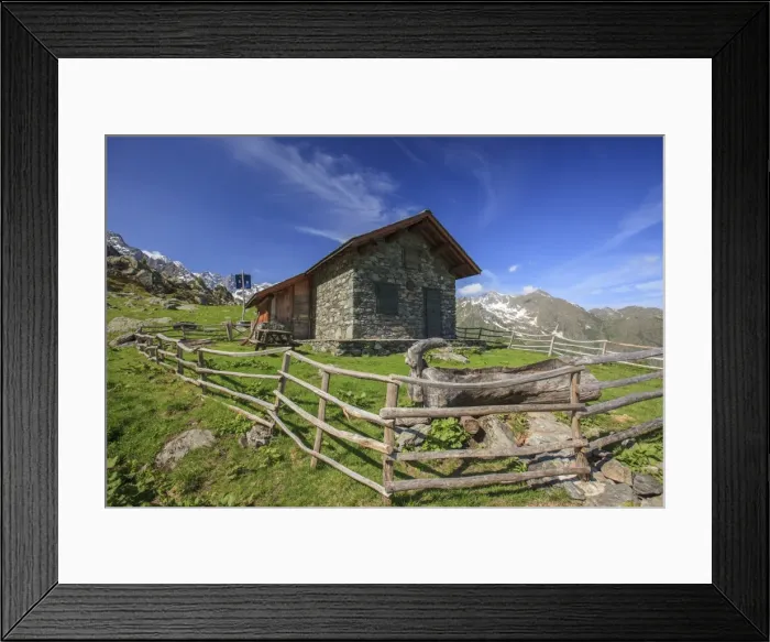 Framed Print : Green meadows and mountain hut on a summer sunny day, Orobie Alps, Arigna Valley Framed Print : Green meadows and mountain hut on a summer sunny day, Orobie Alps, Arigna Valley