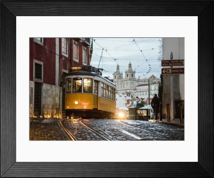 Framed Print : Romantic atmosphere in the old streets of Alfama with the castle in the background