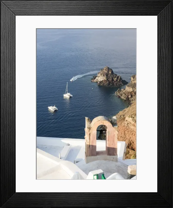 Framed Print : Top view of the blue Aegean Sea from the typical village of Oia, Santorini, Cyclades Framed Print : Top view of the blue Aegean Sea from the typical village of Oia, Santorini, Cyclades
