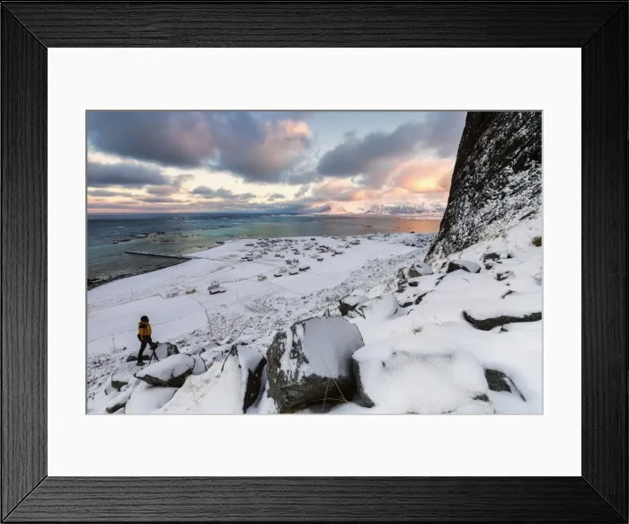 Framed Print : Photographer on the snow admires the fishing village under a colorful sky Eggum, Vestvagoy Framed Print : Photographer on the snow admires the fishing village under a colorful sky Eggum, Vestvagoy
