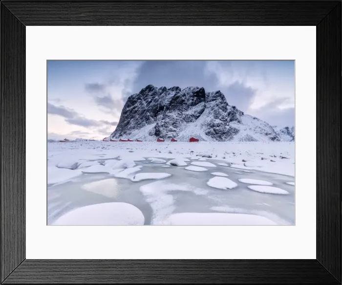 Framed Print : Snowy peaks and ice frame the typical fishermen houses called Rorbu, Eggum, Vestvagoy Framed Print : Snowy peaks and ice frame the typical fishermen houses called Rorbu, Eggum, Vestvagoy