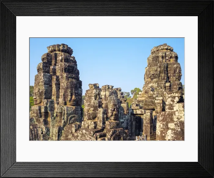 Framed Print : Carved stone faces at Prasat Bayon temple ruins, Angkor Thom, UNESCO World Heritage Site Framed Print : Carved stone faces at Prasat Bayon temple ruins, Angkor Thom, UNESCO World Heritage Site